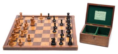 A boxwood and ebony Staunton chess set by Jaques & Son,
