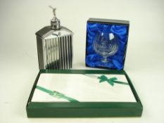 A mid-20th century musical decanter in the form of a Rolls-Royce radiator,