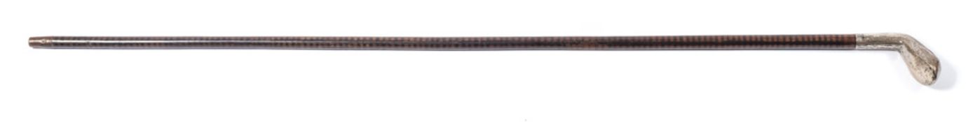 An early 20th century silver mounted golf club headed walking stick:, assays rubbed,