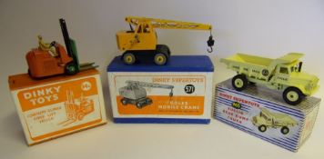 Dinky, No 965 Euclid Rear Dump Truck: pale yellow body and hubs,