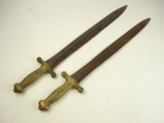 Two 19th century French pattern brass hilted sidearms:,