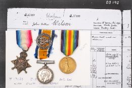 A WWI trio to 'J17189 J A Wilson AB RN':, 1914-15 Star, War Medal, Victory Medal and War Badge.