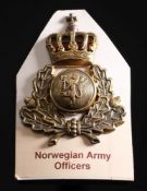 A Norwegian Army Officer's helmet badge:,