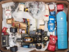 A collection of Corgi, Dinky, and other vehicles:, including a Corgi James Bond Aston Martin DB5,