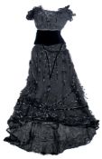 An early 20th century lady's black silk and lacework bodice and skirt:,
