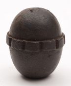 A WWI apple or egg grenade:, stamped 'IN F B' to base, 6cm high.