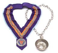 A silk sash for the 'Chanie des Rotisseures' together with a plated wine tasting cup on a chain:,