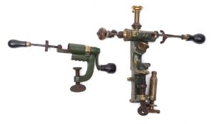 Two 12 bore cartridge loaders overpainted green:,