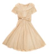 A 1950's cutwork cream dress:.