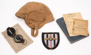 A Royal Flying Corps blazer badge together with a canvas flying helmet:,