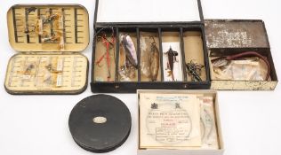 A Hardy circular black lacquer fly/line tin,