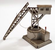 A German tinplate clockwork dockyard crane:,