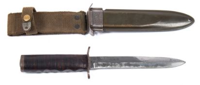 A WWII American M3 fighting knife by Kinfolks Inc:,