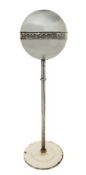 An Emor (Model 200) globe radio on stand:, the chrome plated globe with top vented speaker grill,