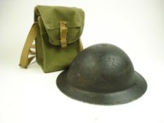 A WWII Allied Steel helmet and a Light II pattern ammunition pouch:,