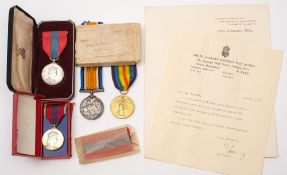 A WWI pair to '21832 Pte D Greaney RAMC' together with a family pair of Elizabeth II Imperial