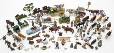 A collection of various farmyard carts and figures by Britains and other makers:,