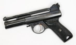 A Webley MK 1 post war air pistol:, .177 calibre with black chequered grips.