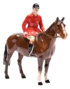 A Beswick model of Huntsman standing, model 1501, in brown gloss finish, 21cm high.