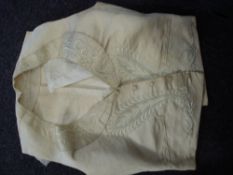 A 19th century ivory silk gentleman's waistcoat: and beadwork bag.