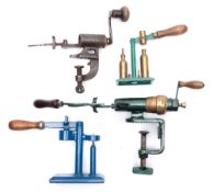 Two 12 bore cartridge loaders together with two cap loaders:,