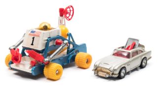 Corgi James Bond 007 'Moon Buggy' (811) together with a James Bond Aston Martin (270):,