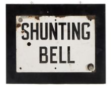 A white and black enamel sign 'Shunting bell' on a later ebonised base:, enamel sign size 25cm x 25.