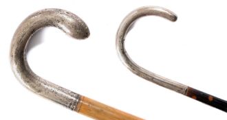 Two silver mounted walking sticks and a silver mounted walking cane:,
