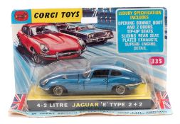 Corgi No.335 Jaguar E-Type:, blue body , black interior with wire wheels in bubble pack.