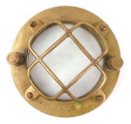 An American diving helmet faceplate:, either by Morse or Schrader, numbered 12183, 15cm diameter.