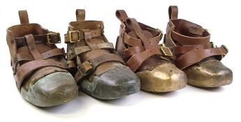 Two pairs of brass sand shoes by Siebe Gorman & Co, London:,