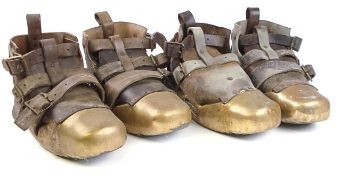 Two pairs of brass sand shoes by C E Heinke & Co Ltd, London:,
