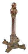 An early 20th century anodised table lighter in the form of Nelson's column:, 28cm high.
