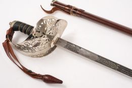 A Royal Marine Examination presentation sword to Colonel J T O Waters:,