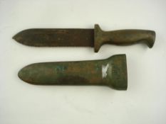 A brass and steel diver's knife by C E Heinke & Co, London:, 6 1/4 inch single edge serrated blade,