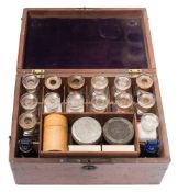 A late 19th /early 20th century mahogany medicine case:, the rectangular case with brass handle,