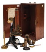 An early 20th century lacquered brass microscope:, unsigned,