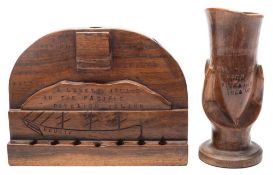 A Pitcairn Island pipe rack and goblet:, the goblet stamped 'Greetings from Pitcairn',