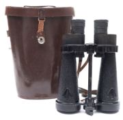 A pair of Admiralty issue Naval binoculars by Barr & Stroud, London:, black crackle finish tubes,