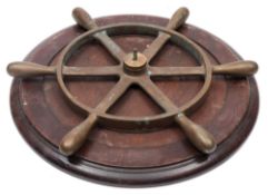 A WWII period brass ship's helm:, of plain six spoke form,