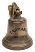 A commemorative brass ship's bell for the Cunard Liner RMS Carmania 1905-1932:,