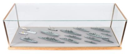 A collection of seventeen die cast waterline models of Royal Navy vessels:, including HMS Exeter,