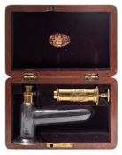 A brass and glass expressing pump by Millikin & Lawley, London:,