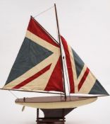 A 20th century model pond yacht:,