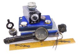A WWII period Mark III compass together with a dashboard clock by Smiths,