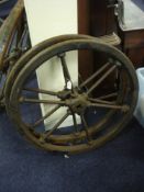 A pair of cast iron diving pump flywheels, probably by Siebe Gorman & Co:.