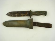 A brass and steel diver's knife by C E Heinke & Co, London:, 6 1/4 inch single edge serrated blade,