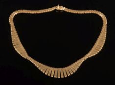 An 18ct gold graduated fringe necklace: approximately 45.5cm total length, 40gms gross weight.