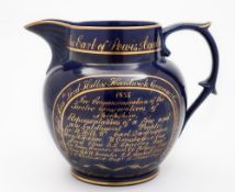 A Coalport cobalt blue glazed Shewsbury Electioneering jug: inscribed in gilt around the rim and