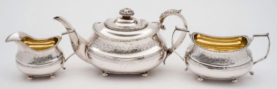 A George III silver three-piece silver tea service, maker Thomas & George Hayter, London,